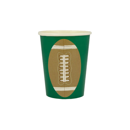 A green paper cup with a soccer ball on it, perfect for birthday parties or Meri Meri Football Cups.