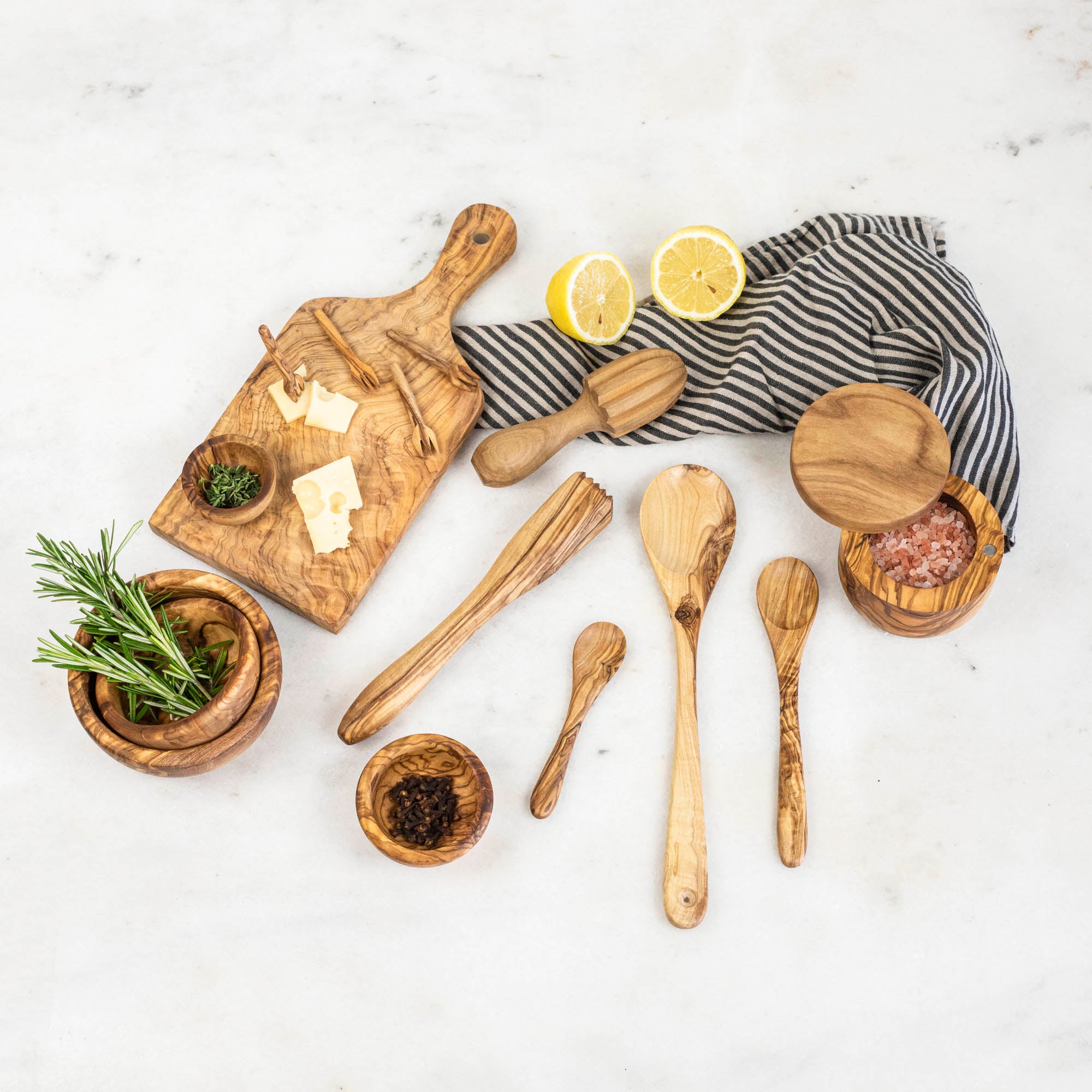 Natural Olivewood utensils for bread cutting and cheese slicing.