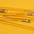 Three Blackwing Volumes 3- Tribute to Musician Ravi Shankar pencils aligned in parallel against a yellow background.